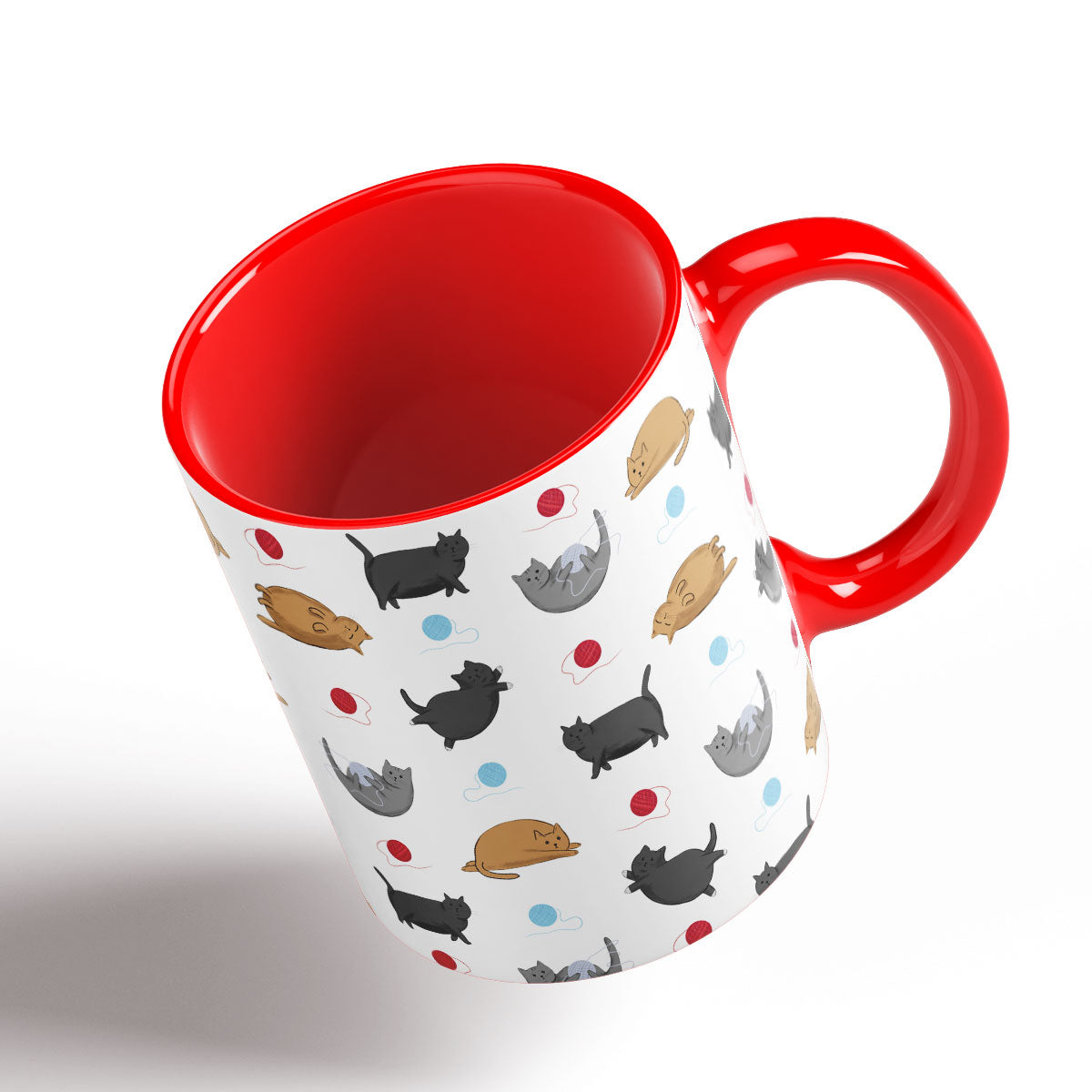 Cute Fat Cats pattern separated by balls of wool. Red Handle and interior.